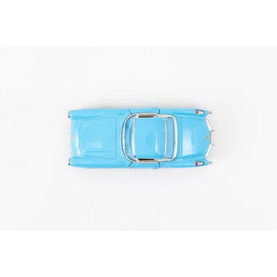 Kép 5/21 - Kinsmart Chevrolet Corvette 1957 fém autó nyitható ajtókkal 1:34 (többféle)