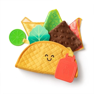 Kép 2/3 - Melissa & Doug bébijáték, Tapintásfejlesztő puha tacoban